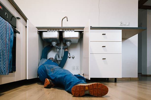 Professional Drain Cleaning technician working in Glenmont, MD